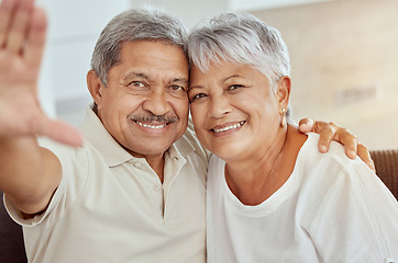 Image showing Senior couple, smile and sofa for selfie with happiness, hand and photography for blog, post or portrait in home. Elderly man, old woman and happy with smile, social media app and profile picture