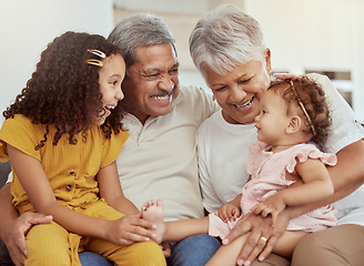 Image showing Home, grandparents and family with children and happiness on a living room couch. Fun, baby smile and bonding with childcare, love and kids together with a young girl and newborn on a house sofa