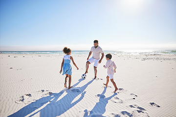 Image showing Soccer, family and ball at the beach with freedom, happy and bonding in nature. Sports, football and children with father at the ocean for travel, vacation and game while traveling together in Mexico