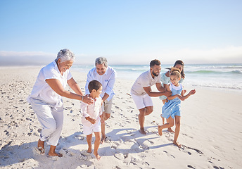 Image showing Travel, holiday and big family playing on beach for running and bonding on weekend trip. Happy, excited and children having fun with their grandparents and parents by the ocean on tropical vacation.