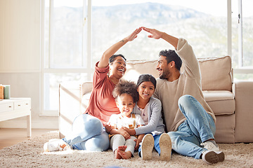 Image showing Parents, floor and roof hands with kids, happiness and sign for safety, security or family home with bond in lounge. Father, mother and daughters for care, love or together with icon, emoji and smile