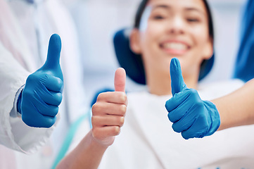 Image showing Dentist, thumbs up and happy patient in consultation for teeth whitening, service and dental care. Healthcare, dentistry and hand sign of orthodontist and woman for oral hygiene, wellness or cleaning