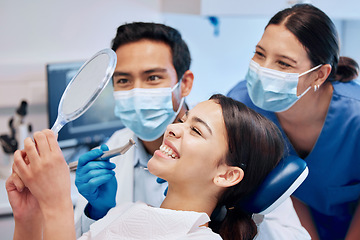 Image showing Dentist, mirror and woman with smile in consultation for teeth whitening, service and dental care. Healthcare, dentistry and female patient with orthodontist for oral hygiene, wellness and cleaning