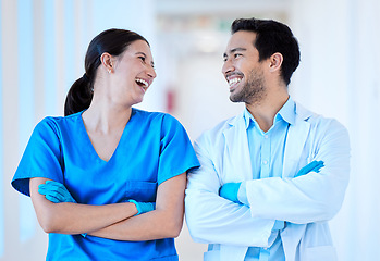 Image showing Dentist, nurse laugh and arms crossed with assistant and funny joke at dental office and clinic. Comedy, woman worker and healthcare professional with happiness and laughing in workplace with smile