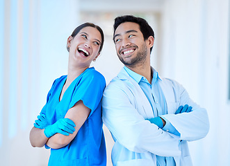 Image showing Dentist, laugh and arms crossed with assistant and funny joke at dental office and clinic. Comedy, woman worker and healthcare professional with happiness and laughing in workplace with smile