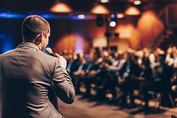 Image showing Public speaker giving talk at Business Event.