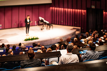 Image showing Woman giving presentation on business conference event.