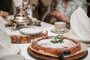 Image showing Apples pie with samovar