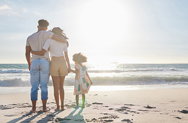 Image showing Family, back with parents and child on beach, travel and people together on sand with sea view and mockup space. Love, care and sun, man with woman and girl outdoor, tourism and vacation in Mexico