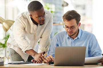 Image showing Laptop, black man or manager coaching a worker with notes or research project in digital agency. Paperwork, boss or person helping, training or speaking of SEO data or online business to employee