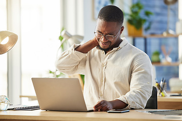 Image showing African business man, neck pain and laptop with burnout, stress and muscle injury at desk in web design job. Developer, black businessman and entrepreneur with computer with fatigue in modern office