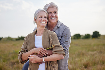 Image showing Love, hug and happy with old couple in nature for bonding, smile and romance. Happiness, retirement and support with senior man and woman in countryside for affectionate, holiday and vacation