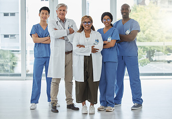 Image showing Leadership portrait, doctors and nurses with arms crossed standing together in hospital. Face, teamwork and confident medical professionals, group or happy surgeons with collaboration for healthcare