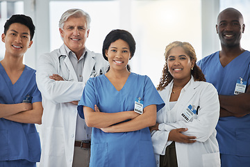 Image showing Smile, portrait and team of doctors with arms crossed standing together in hospital. Face, confident or medical professionals, nurses or surgeon group with healthcare collaboration, teamwork or trust