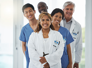 Image showing Portrait, nurses and team of doctors in line, smile and standing together in hospital. Face, healthcare and medical professionals, group diversity or happy surgeons in collaboration for leadership.