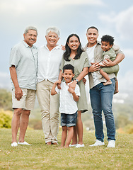 Image showing Portrait, smile and family outdoor, love and carefree with happiness, cheerful and bonding together. Face, happy grandparents and mother with father, kids and children outside, freedom and loving