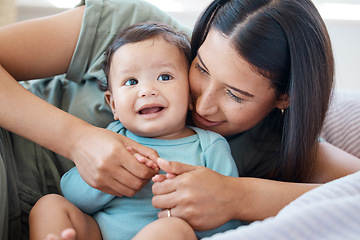 Image showing Mom, baby and play on bed in home for love, care and quality time together with joy, growth and kids development. Happy mother, infant child and fun with newborn girl, relax and childcare in bedroom