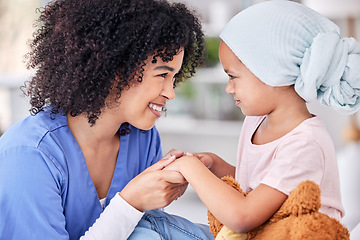 Image showing Smile, nurse and child on bed in hospital for children, health and medicine, support and trust in cancer treatment. Paediatrics, healthcare and kid, nursing caregiver holding hands with young patient