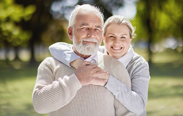 Image showing Old couple hug in park with love and smile in portrait, retirement together with trust and support with care. Elderly man, woman and marriage with commitment, relationship and happy people outdoor