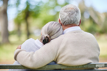 Image showing Back view of old couple, hug in park with love and view of nature, retirement together and peace. Elderly man, woman and marriage with commitment, relationship and pension with trust and care outdoor