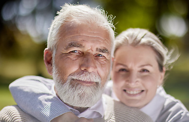 Image showing Old couple hug in park with love, face and portrait with smile, retirement together with trust and support. Elderly man, woman and marriage with commitment, relationship and happy people outdoor