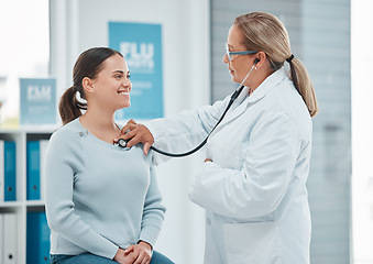 Image showing Healthcare, doctor exam with woman patient and consultation with stethoscope at a hospital. Medicine or health wellness, cardiology and surgeon medical test with a female person in a clinic building