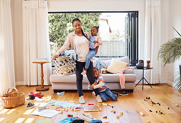 Image showing Toys, children and mother with stress, laundry and home with tantrum, messy living room and anxiety. Family, mama and kids with housekeeping, burnout and mental health issue with untidy living room