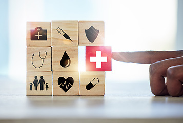 Image showing Hand man and building blocks with medical icons for investment, security and insurance cover. Finger, choice and male with puzzle for healthcare, family or asset management, safety or future planning