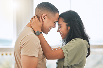 Image showing Couple, love and forehead touch in home for happiness, intimacy and relax for romance, bonding and trust together. Happy man, woman and hug partner for quality time, care and smile for commitment