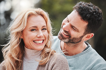 Image showing Happy, portrait and a couple with love in nature for a date, marriage anniversary or bonding. Smile, laughing and a mature man and woman with affection, happiness and quality time in a park together