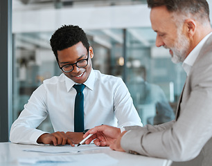 Image showing HR, interview and contract with a business man and candidate for a vacancy meeting in an office. Manager, recruitment and opportunity with human resources reading a cv or resume in the boardroom