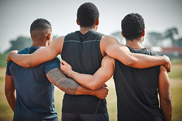 Image showing Back, group hug and athlete men with teamwork outdoor for running, sports or workout. Collaboration, hugging and rear view of people, friends and runners for fitness, support and exercise together.