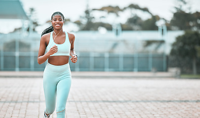 Image showing Portrait, city and black woman running, workout goal and exercise for wellness, sports and training. Face, female person and runner with earphones, cardio and athlete with self care and stress relief