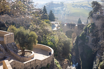 Image showing Panoramic view of hanging gardens of Cuenca over El Tajo Gorge with whitewashed houses of Ronda, Andalusia, Spain.