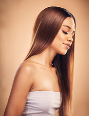 Image showing Beauty, hair and face profile of woman in studio for wellness, keratin treatment and haircare aesthetic. Salon, hairdresser and happy female person on brown background for growth, shine and texture