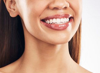 Image showing Woman, mouth and teeth with dental and smile, happiness with beauty and oral hygiene isolated on white background. Health, wellness and happy female model, orthodontics and lips with shine in studio