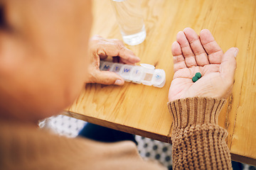 Image showing Senior person, hand and pill box for daily medication, health and prescription medicine, sick and old age. Vitamins, supplements and elderly with pills for the week, healthcare and retirement