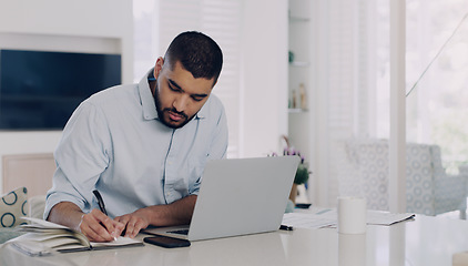 Image showing Man, remote work and writing notes at laptop in home office for digital planning, online research and information. Male freelancer, notebook and working on computer technology, internet and budget