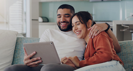 Image showing Tablet, couple and laughing on couch in home for social media, funny news and online meme. Happy man, woman and relax with digital technology, subscription and streaming comedy on network connection