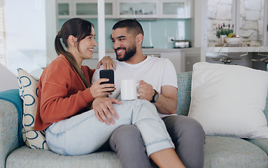 Image showing Happy, couple and cellphone on sofa in living room with social media post, online subscription and mobile app. Man, woman and smartphone for digital connection, technology and coffee to relax at home