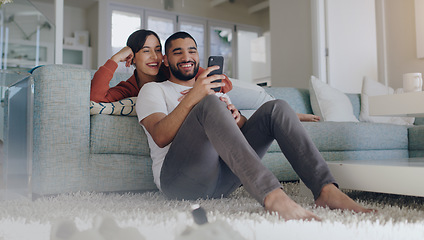 Image showing Phone, happy and couple on sofa in home for social media, online website and internet news. Communication, relationship and man and woman relax on smartphone for quality time, bonding and network