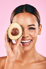 Image showing Happy woman, portrait and avocado for natural skincare, beauty or cosmetics against a pink studio background. Female person or model smile with vegetable for healthy nutrition, fiber diet or wellness