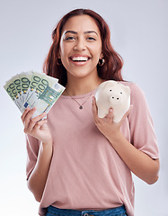 Image showing Money, portrait or happy girl with a piggy bank for financial wealth or savings on white background. Finance, investment or woman smiling or investing Euros or budget in tin for safety or security