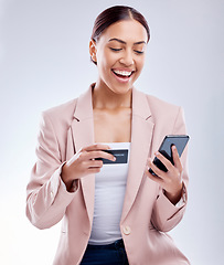 Image showing Investment, phone or happy businesswoman with credit card for online investment on digital fintech in studio. Financial mobile app, ecommerce payment or funny person typing banking data on internet