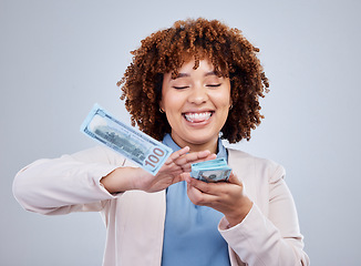 Image showing Woman throw cash from hands isolated on a white background in winning, wealth success or financial freedom. Excited african person or happy winner with money rain bonus, cashback or lottery in studio