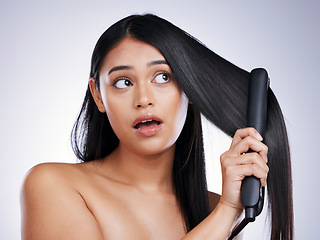 Image showing Haircare, flat iron and face of woman with long hair, heat and luxury salon treatment on white background in Brazil. Beauty, straightener and latino model with straight hairstyle on studio backdrop.