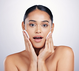 Image showing Beauty, face and clean cotton on skin of woman in studio for natural dermatology and cosmetics. Female person with a skincare wipe in hand for health, wow review and wellness on a white background