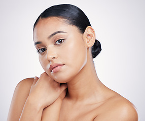 Image showing Skin, face and beauty of a woman in studio for glow, dermatology and cosmetics. Portrait of aesthetic female person with natural shine, facial self care or health and wellness on a white background