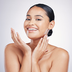 Image showing Natural beauty, smile and face of a woman in studio for glow, dermatology or cosmetics. Portrait of a happy aesthetic model person with self care, facial or skincare results on a white background