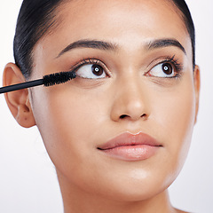 Image showing Mascara, brush and eye makeup, beauty with woman and face, eyelash extension isolated on studio background. Female model closeup, natural cosmetics and skin glow with cosmetic product and cosmetology